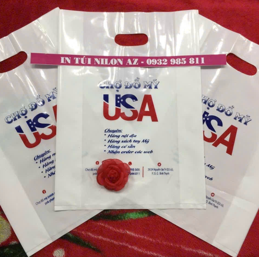 Portrait of a woman wearing a green-trimmed white polo