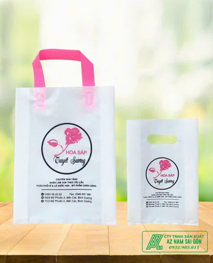 Portrait of a woman wearing a green-trimmed white polo